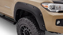 Bushwacker 16-18 Toyota Tacoma Pocket Style Flares 4 piezas 60.5/73.7 pulgadas cama - Negro