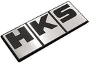 Emblema del logotipo del bloque plateado de HKS